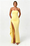 Elegant French-style pale yellow strapless maxi dress with a slit.