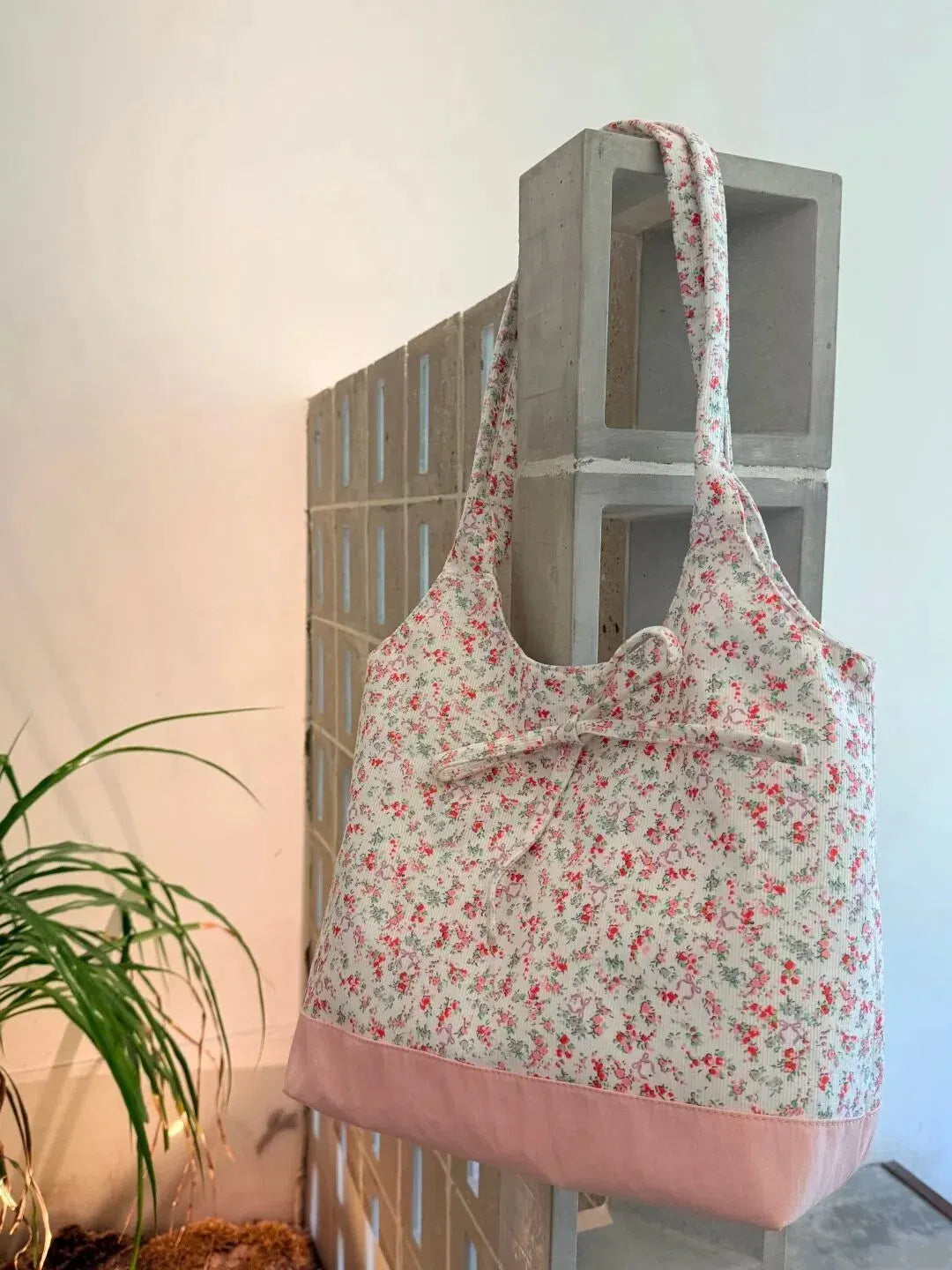 Pink base and floral pattern canvas tote bag